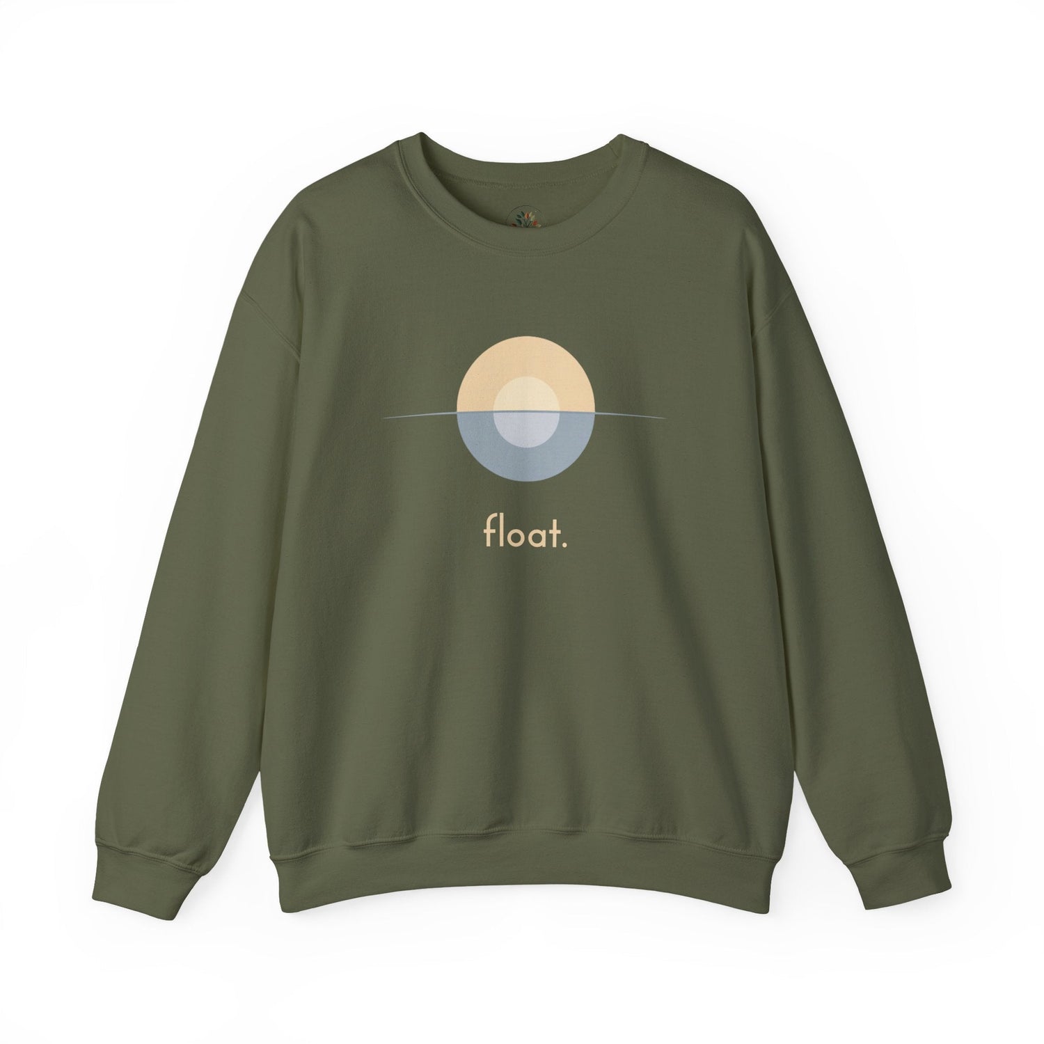 Military green crewneck sweatshirt featuring a minimalist geometric design — a warm sandy semicircle above and a muted blue-gray semicircle below, split by a thin horizon line — with "float." printed beneath in soft sand lettering.