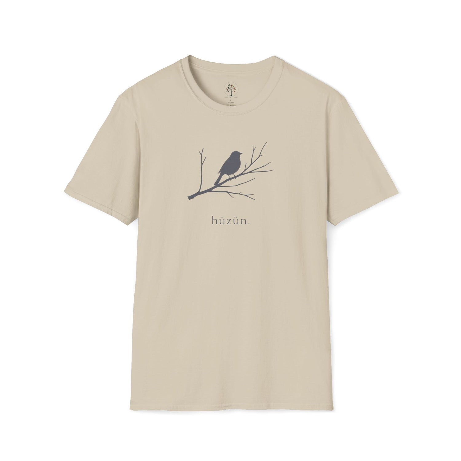 Hüzün graphic t-shirt in sand — minimalist bird on a bare branch design with the word hüzün, nature-inspired slow living tee, Trees & Leaves