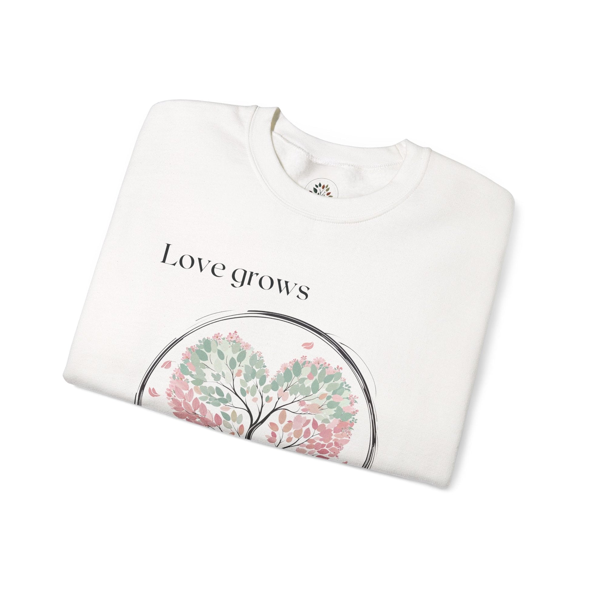 White | Love Grows Sweatshirt, folded view